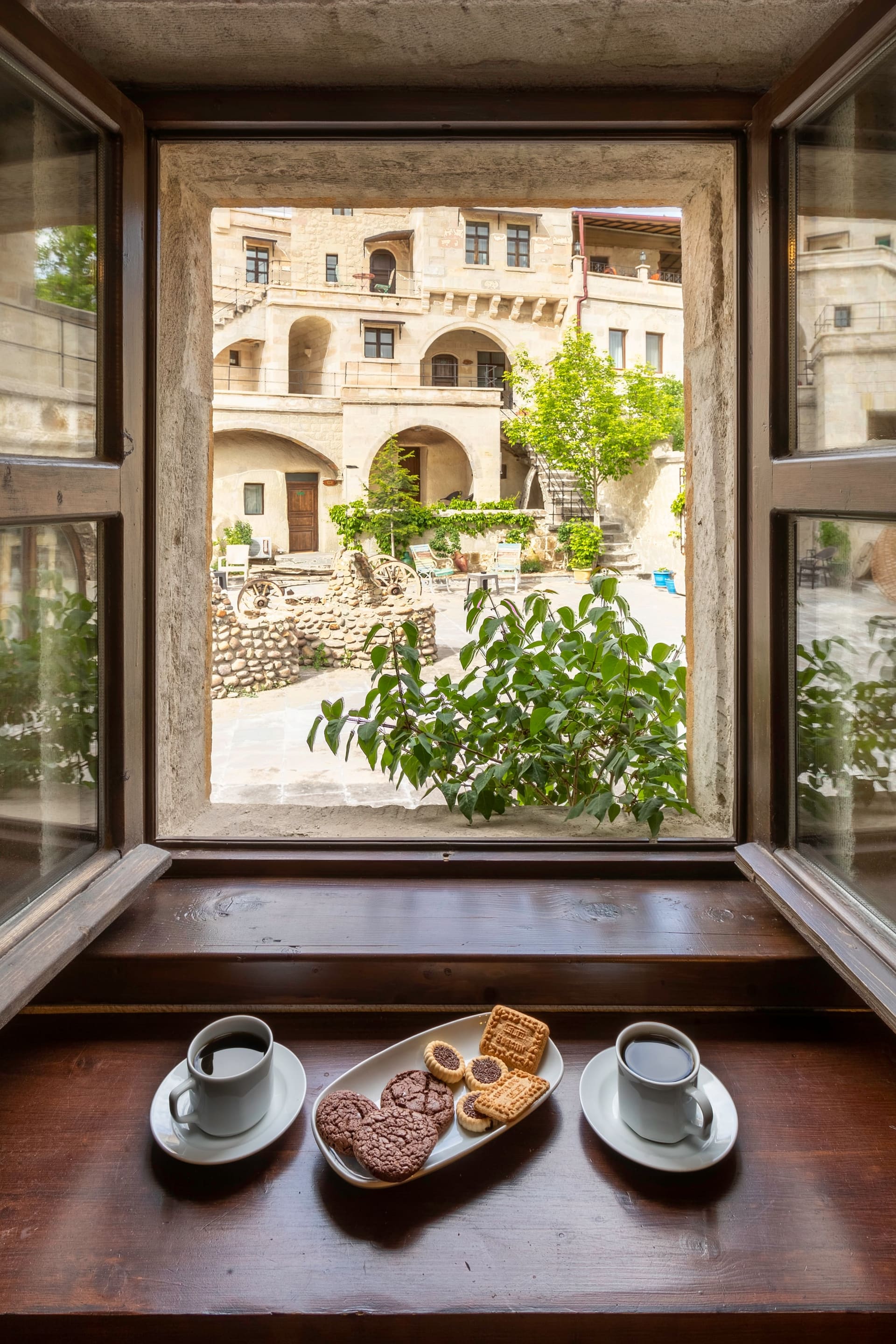 Room 116, Deluxe: Breakfast tray by the window, courtyard view
