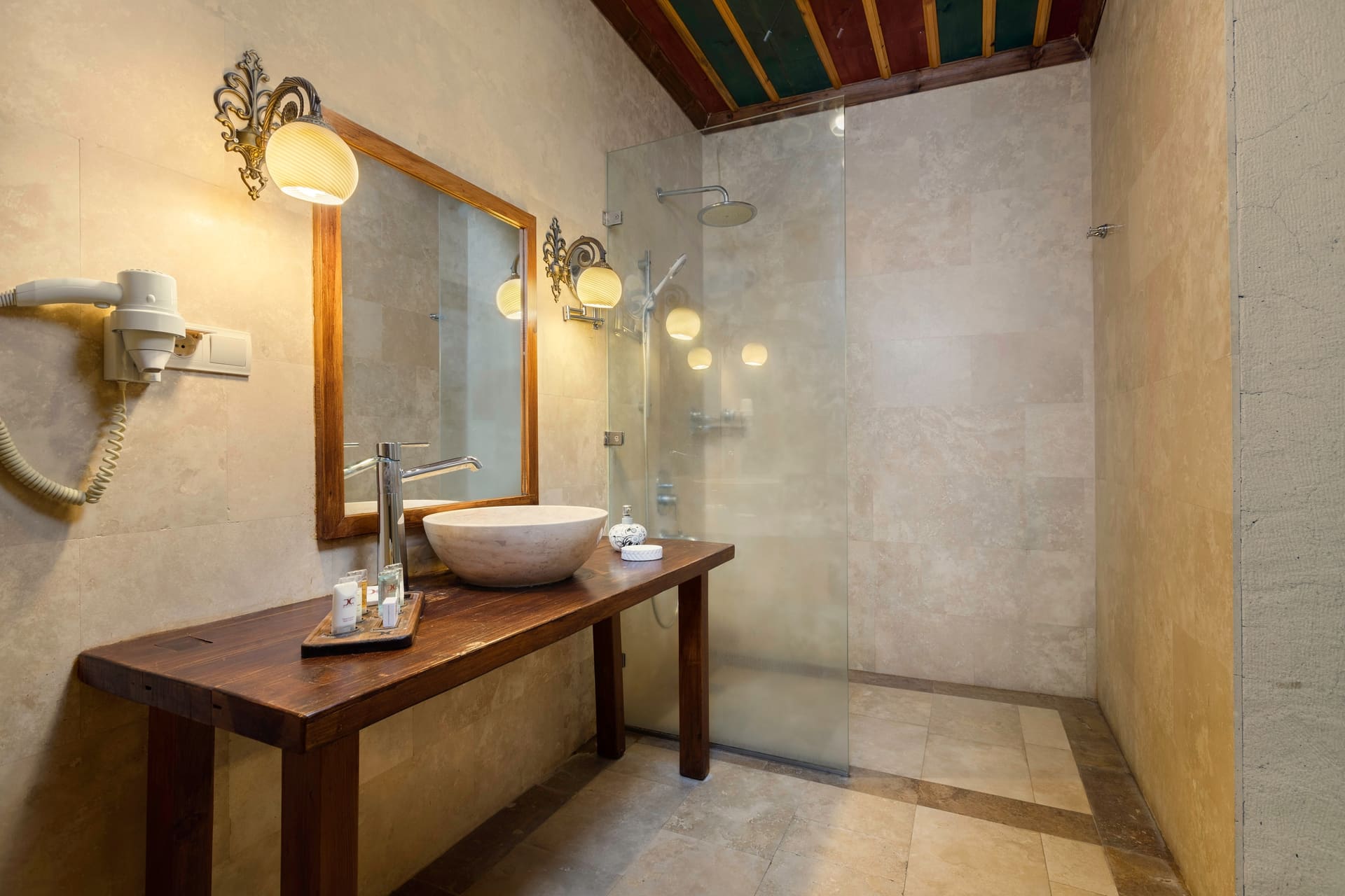 Room 101, Deluxe: Walk-in shower bathroom, sink on a wooden counter, hairdryer